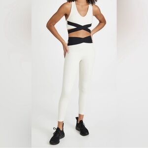 Le Ore Women's Bandier Revolve Off White Black Contrast Cross Over Leggings Sm